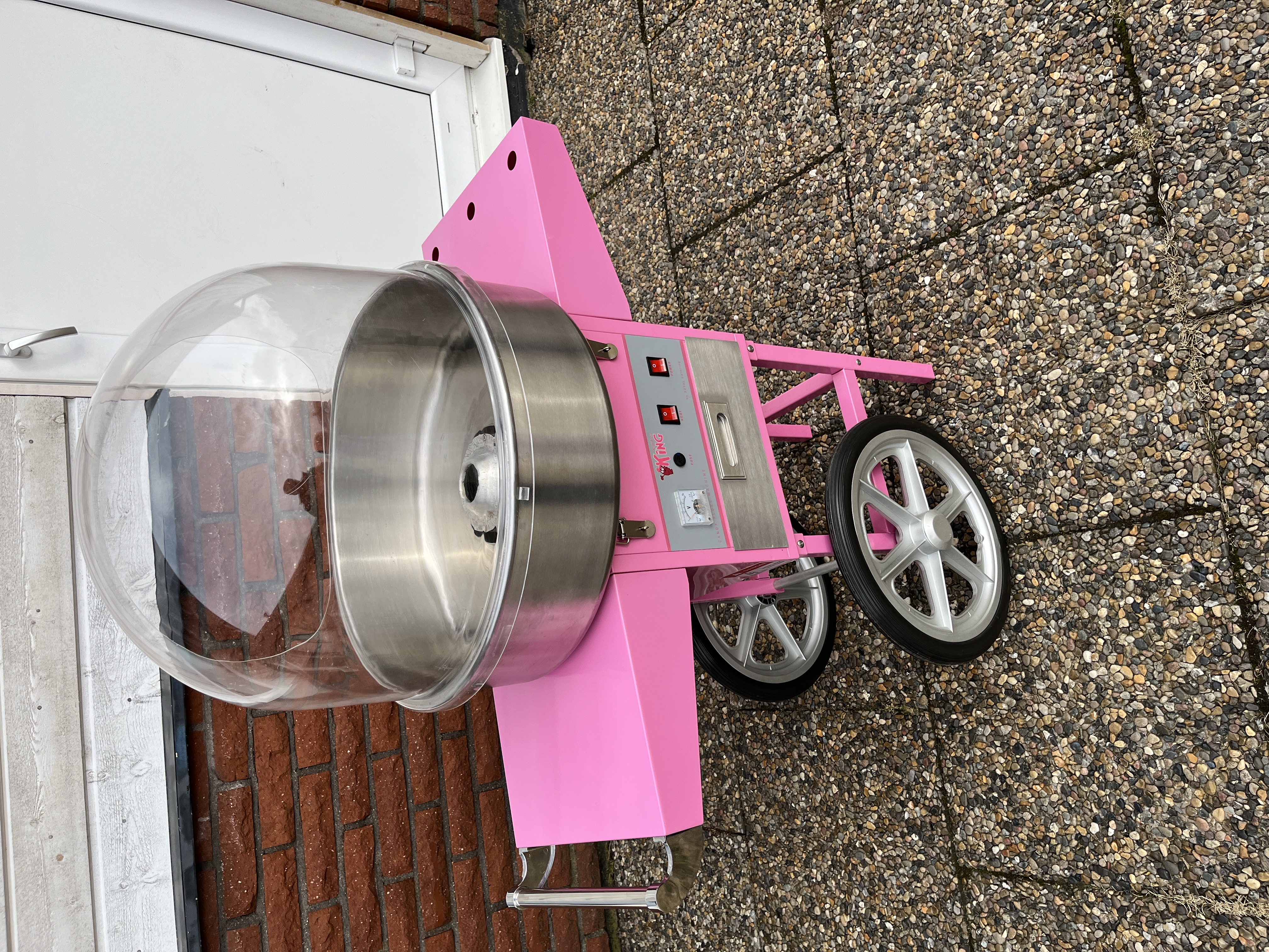 Rosa sockervaddsmaskin med vagn