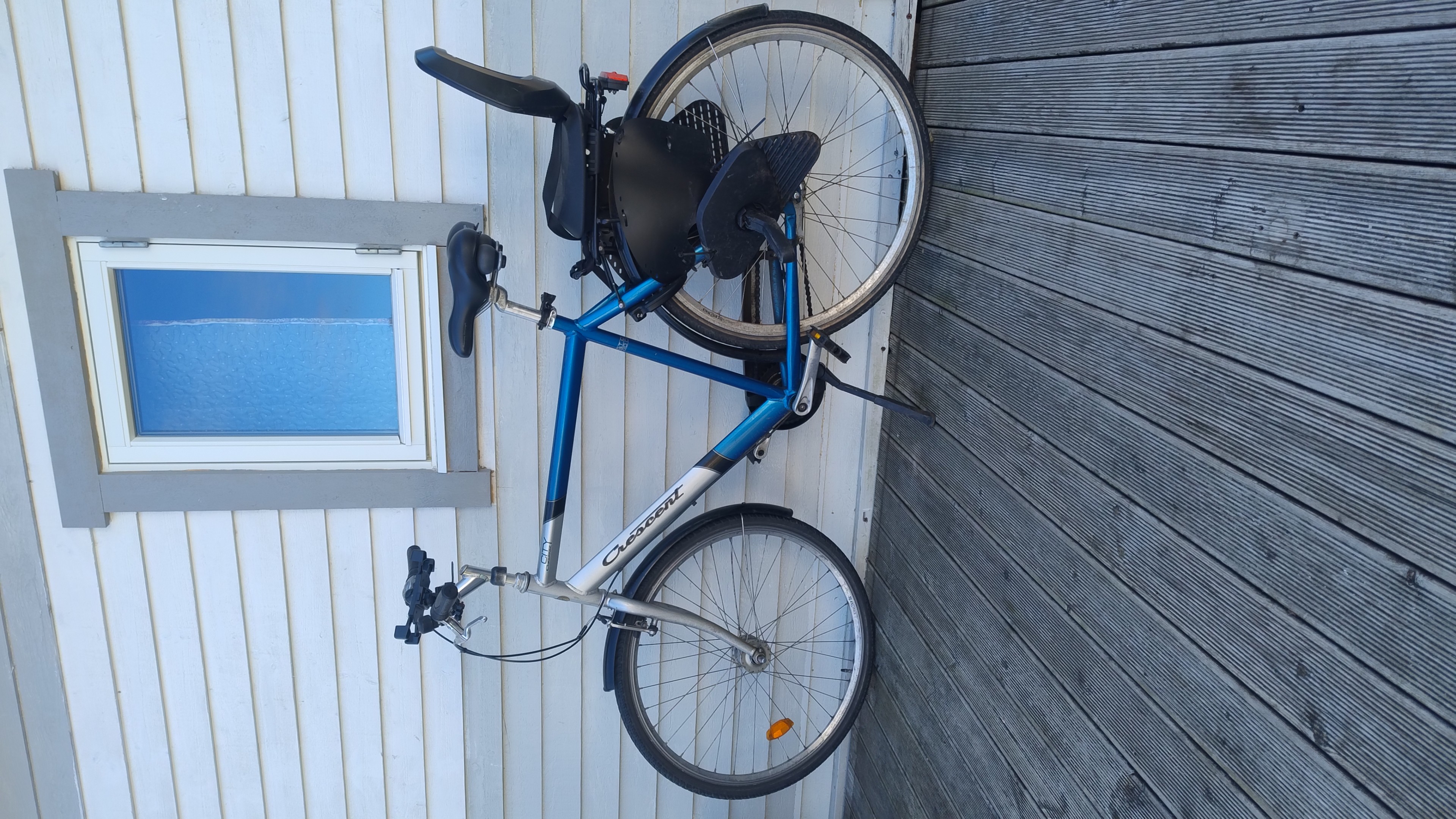Crescent citycykel med barnsits (upp till 35 kg), 7 växlar & mobilhållare