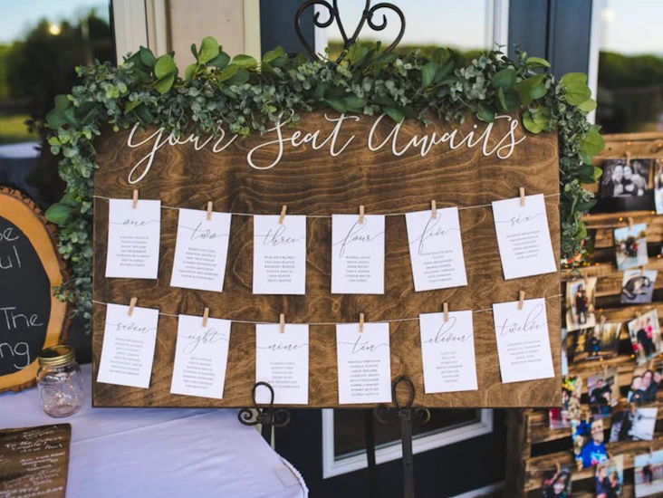 Rustic wooden wedding seating chart for rent – easel, twine & clothespins included