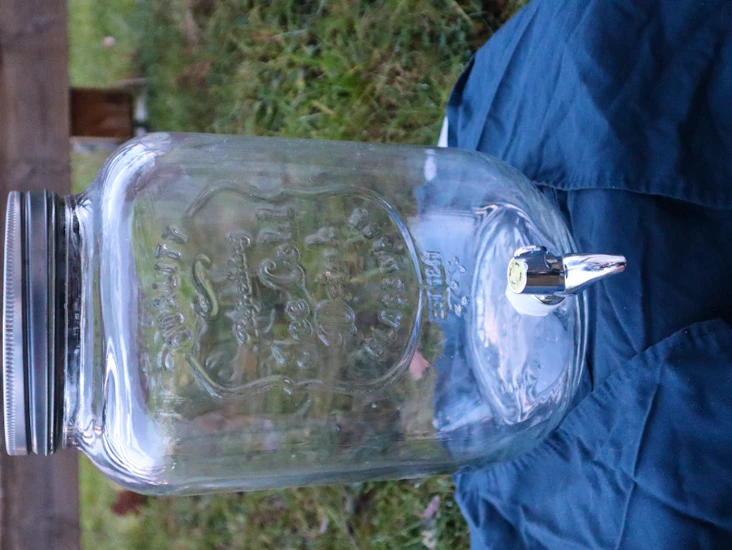 Behållare med tappkran