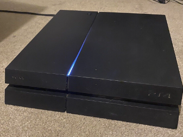 Playstation 4 with two controllers