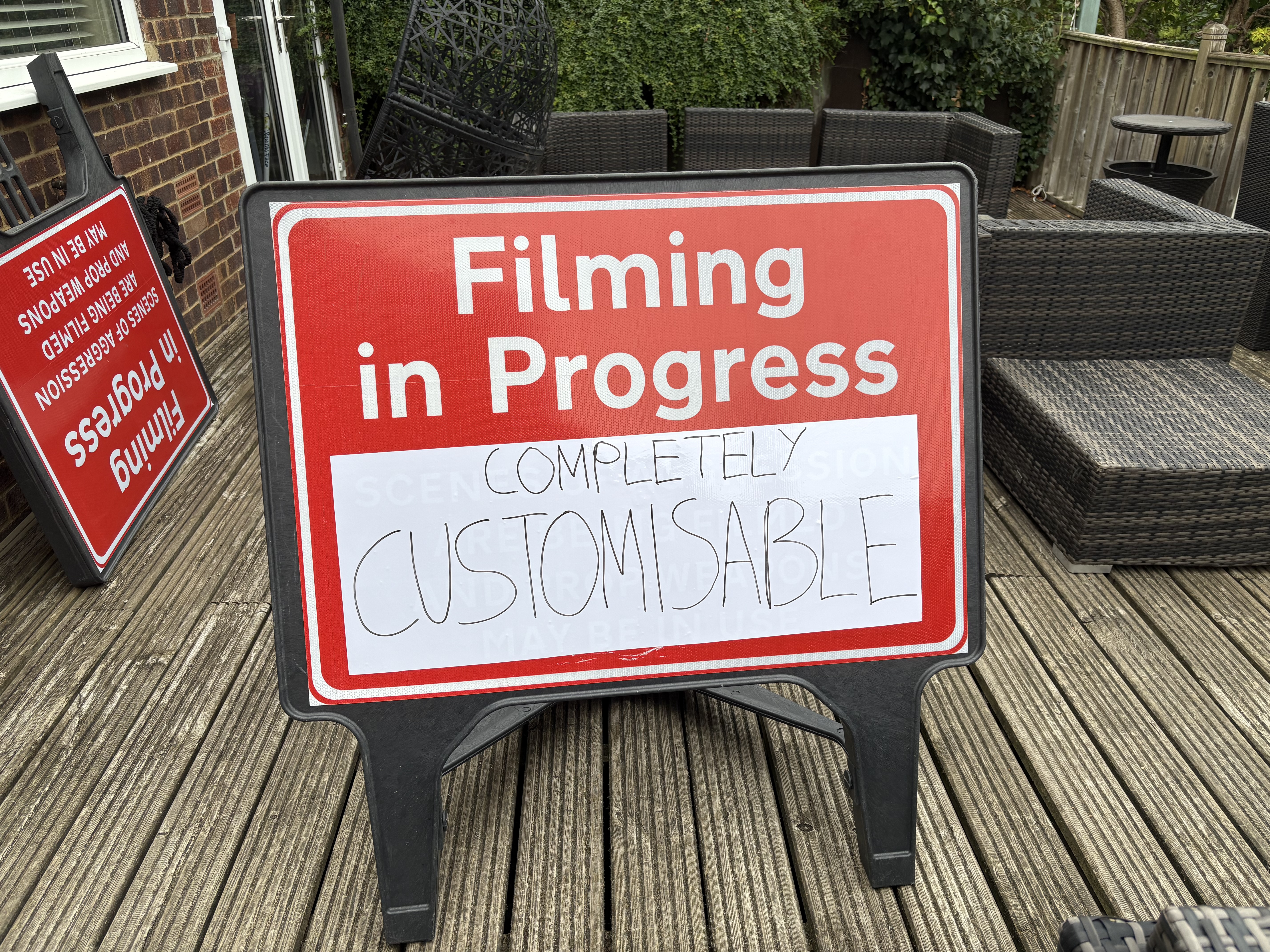 Filming in progress signs - customisable with whiteboard sticker