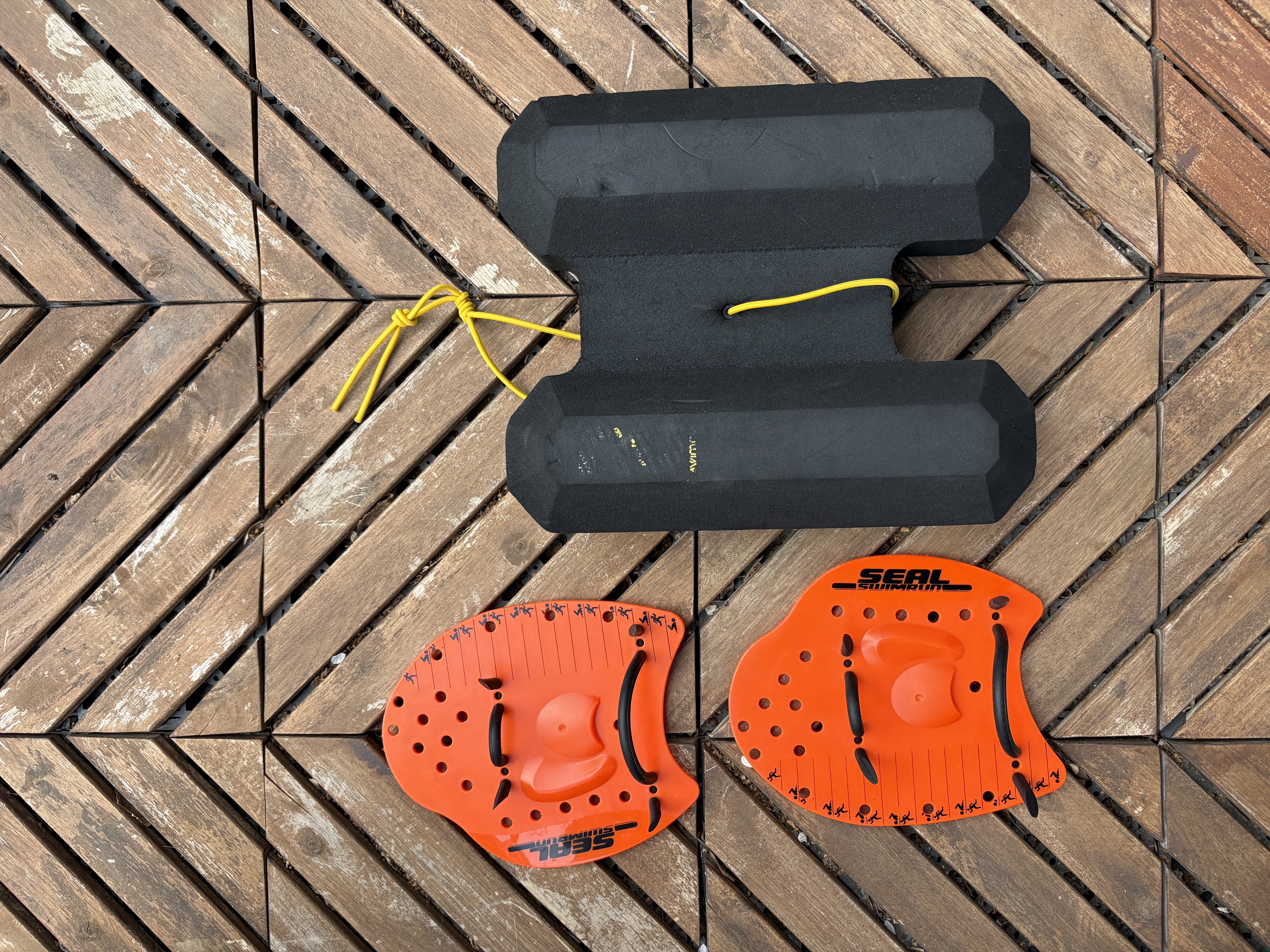 Swimrun startpaket: pull buoy + paddlar (strl m)