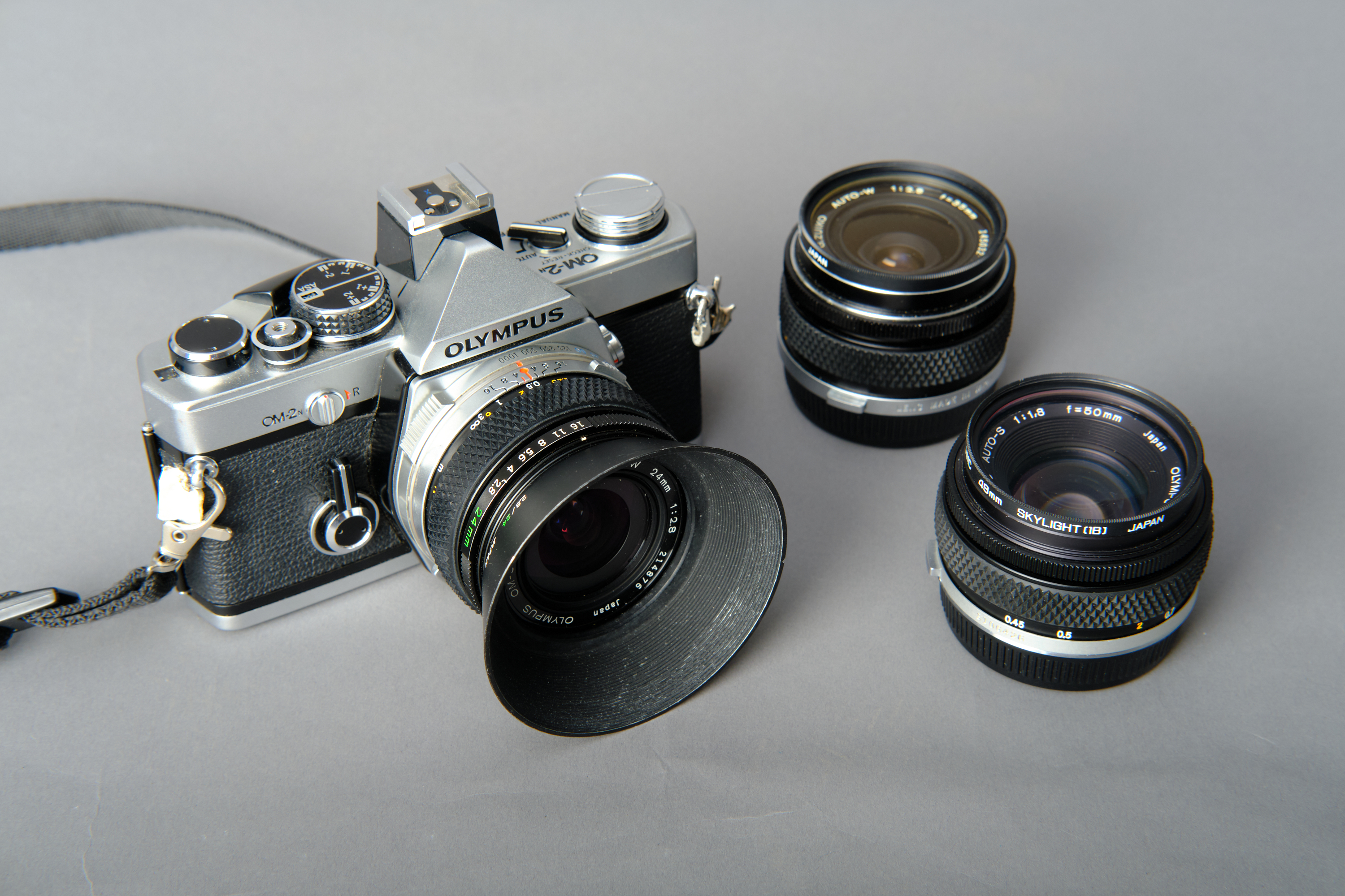 Olympus om2n film camera and manual lens kit - 24mm, 35mm and 50mm lenses