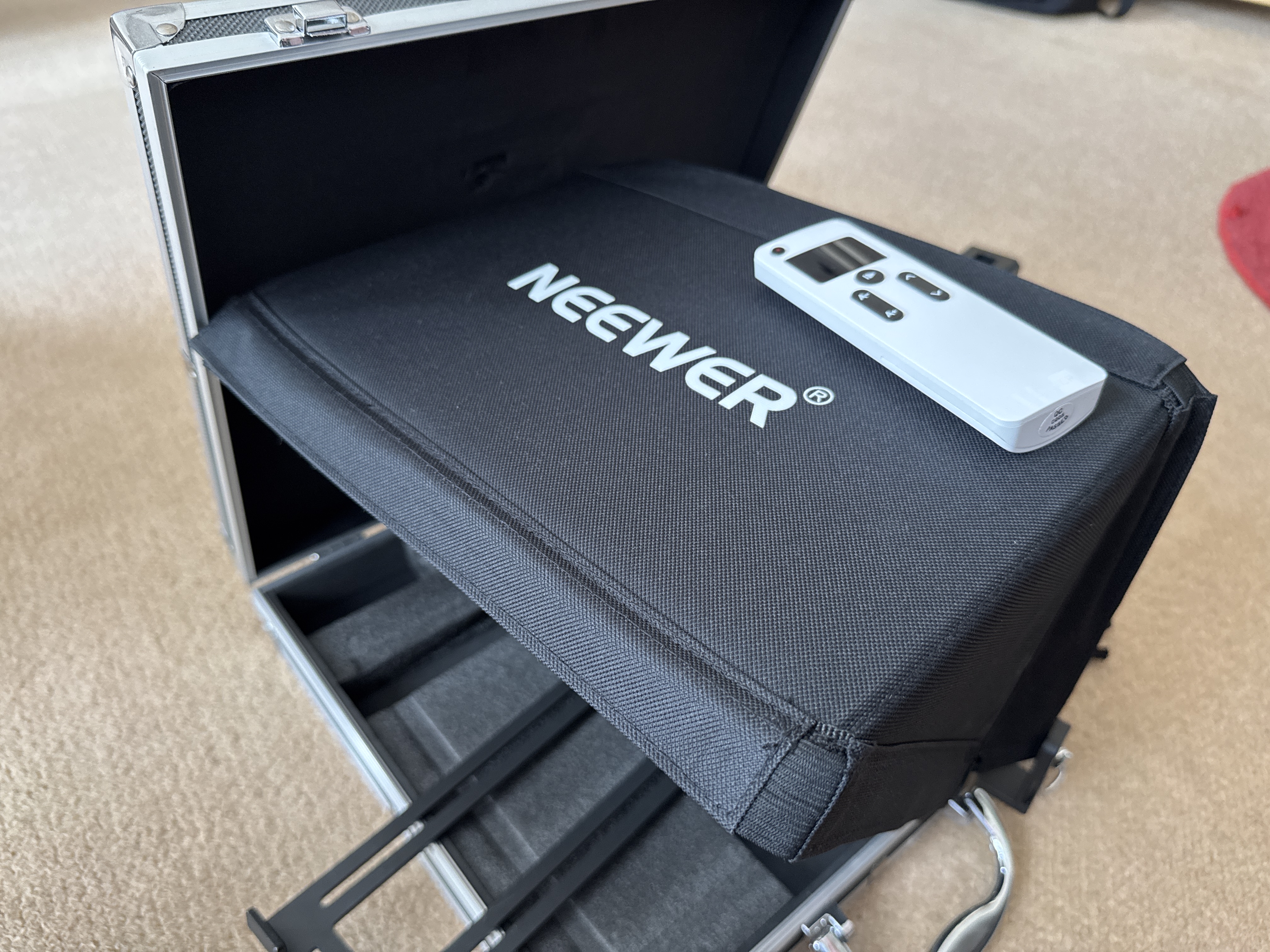 Neewer x12 aluminum teleprompter with remote, phone holder, light stand and ipad