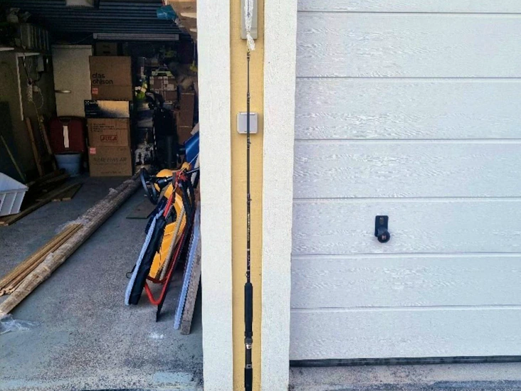 Havsfiskespö med rulle