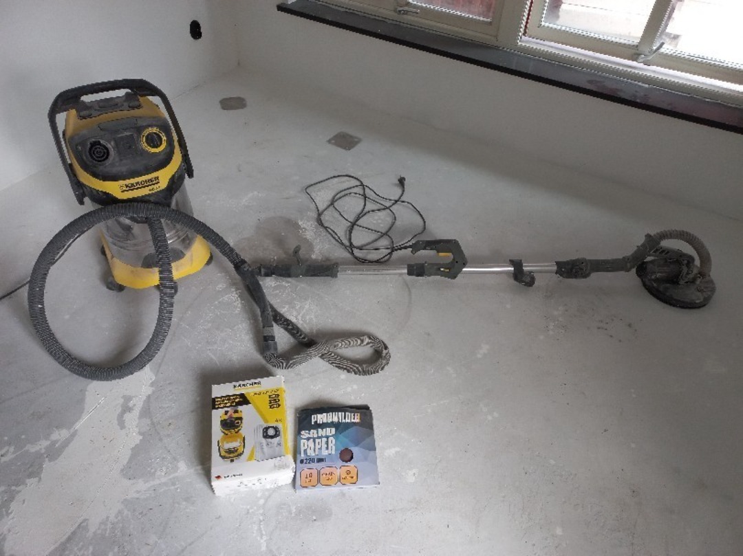 Vägg och takslip med dammsugare