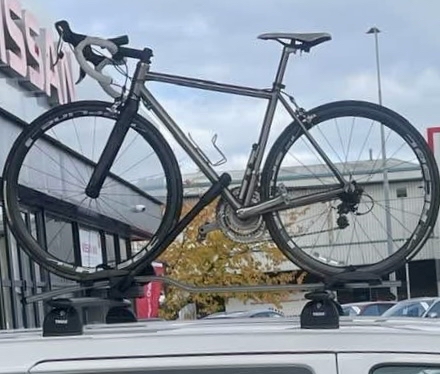 Road bike, ti frame & carbon wheels