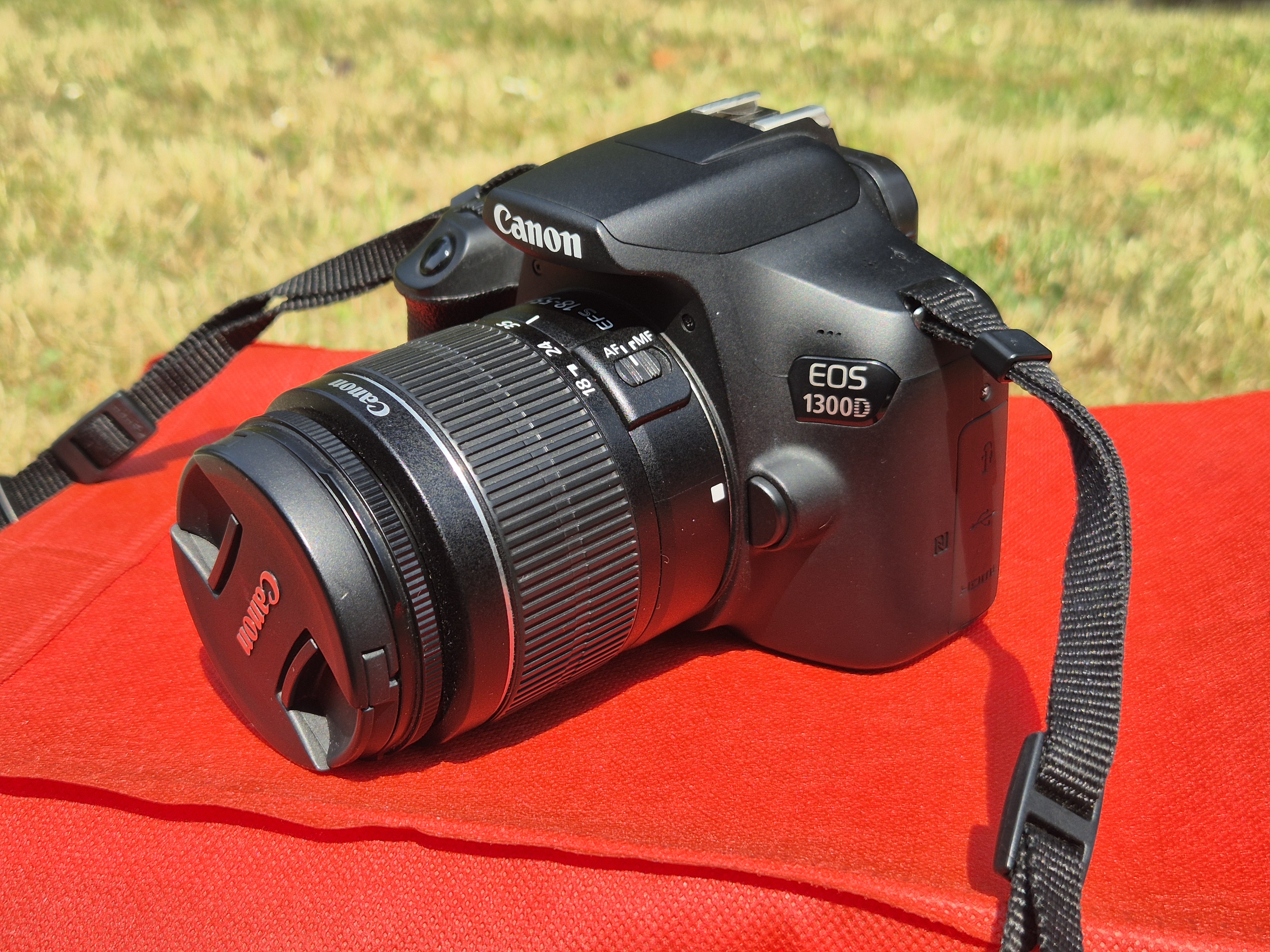 Canon eos 1300d with 18-55mm lens. 28-80mm available