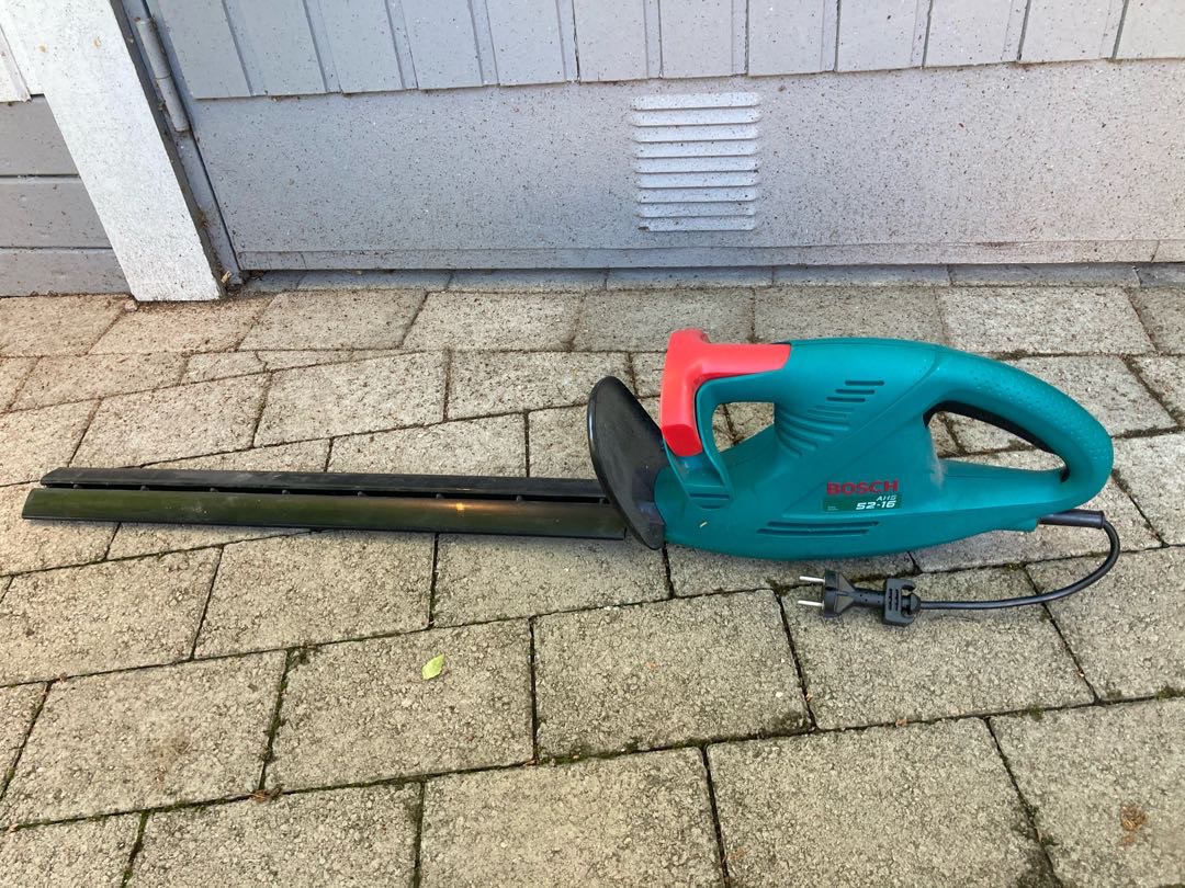 Häcktrimmer / häcksax eldriven