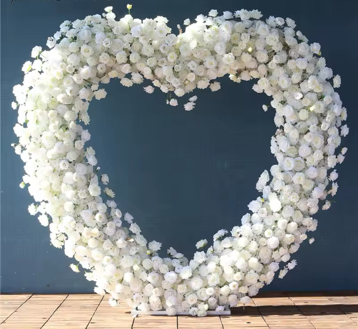Heart shape white flower for hire.