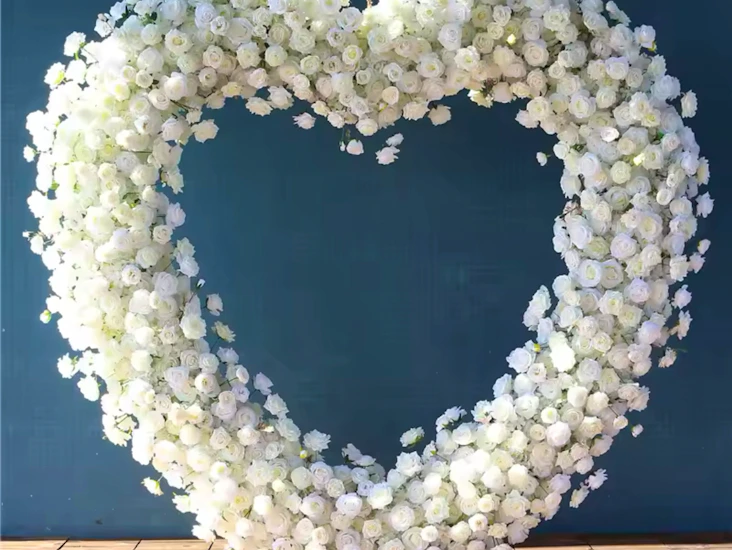 Heart shape white flower for hire.